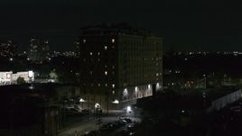 5.7K aerial stock footage approaching Pasadena Apartments at nighttime, Detroit, Michigan Aerial Stock Footage | DX0002_198_063