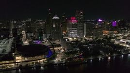 5.7K aerial stock footage static view of towering skyscrapers and Hart Plaza at night, Downtown Detroit, Michigan Aerial Stock Footage | DX0002_199_006