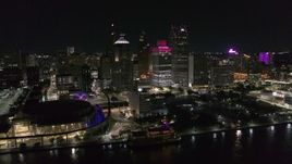 5.7K aerial stock footage of orbiting towering skyscrapers and Hart Plaza at night, Downtown Detroit, Michigan Aerial Stock Footage | DX0002_199_007
