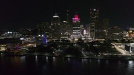 5.7K aerial stock footage orbit Hart Plaza and towering skyscrapers at night, Downtown Detroit, Michigan Aerial Stock Footage | DX0002_199_010