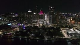 5.7K aerial stock footage of an orbit of Hart Plaza and nearby skyscrapers at night, Downtown Detroit, Michigan Aerial Stock Footage | DX0002_199_017