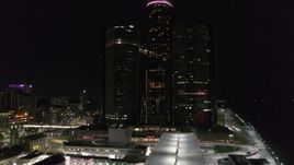5.7K aerial stock footage focus on GM Renaissance Center during descent at night, Downtown Detroit, Michigan Aerial Stock Footage | DX0002_199_030