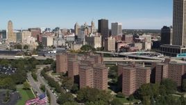 5.7K aerial stock footage ascend past apartment complex while focused on Downtown Buffalo, New York Aerial Stock Footage | DX0002_200_002