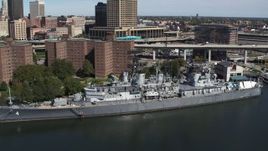 5.7K aerial stock footage of a reverse view of the USS Little Rock in Downtown Buffalo, New York Aerial Stock Footage | DX0002_200_021