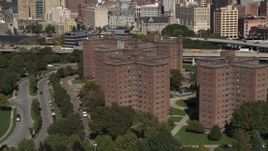 5.7K aerial stock footage descend past Marine Drive Apartments, Downtown Buffalo, New York Aerial Stock Footage | DX0002_201_005