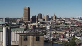 5.7K aerial stock footage a view of the city's skyline from the river, Downtown Buffalo, New York Aerial Stock Footage | DX0002_201_014