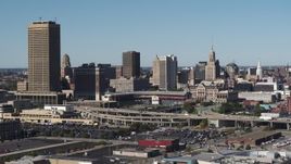 5.7K aerial stock footage a view of the city's skyline behind Sahlen Field baseball stadium, Downtown Buffalo, New York Aerial Stock Footage | DX0002_201_027