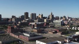 5.7K aerial stock footage of office towers near the community college while descending, Downtown Buffalo, New York Aerial Stock Footage | DX0002_202_020