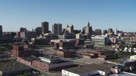5.7K aerial stock footage ascending for a view of office towers near the community college, Downtown Buffalo, New York Aerial Stock Footage | DX0002_202_021
