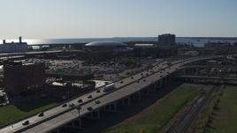 5.7K aerial stock footage focus on KeyBank Center arena and descend by freeway, Downtown Buffalo, New York Aerial Stock Footage | DX0002_202_024
