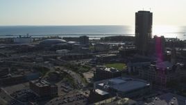 5.7K aerial stock footage arena and baseball stadium by skyscraper in Downtown Buffalo, New York Aerial Stock Footage | DX0002_203_009