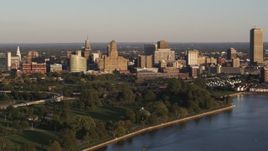 5.7K aerial stock footage of the downtown skyline seen from the lake at sunset, Downtown Buffalo, New York Aerial Stock Footage | DX0002_203_039
