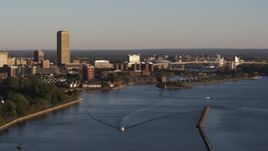 5.7K aerial stock footage of Seneca One Tower and Buffalo River at sunset, Downtown Buffalo, New York Aerial Stock Footage | DX0002_203_041