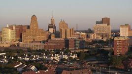 5.7K aerial stock footage of city hall beside the Buffalo City Court at sunset, Downtown Buffalo, New York Aerial Stock Footage | DX0002_204_001