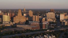 5.7K aerial stock footage of city hall beside courthouse and office buildings at sunset, Downtown Buffalo, New York Aerial Stock Footage | DX0002_204_002