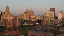 5.7K aerial stock footage of city hall, courthouse and office buildings seen from condos at sunset, Downtown Buffalo, New York Aerial Stock Footage | DX0002_204_004