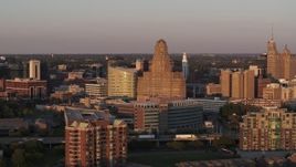 5.7K aerial stock footage of a view of city hall at sunset, Downtown Buffalo, New York Aerial Stock Footage | DX0002_204_005