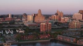 5.7K aerial stock footage of city hall, courthouse and office buildings at sunset, Downtown Buffalo, New York Aerial Stock Footage | DX0002_204_023