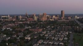 5.7K aerial stock footage of a wide view of the city's skyline at twilight, Downtown Buffalo, New York Aerial Stock Footage | DX0002_204_028