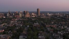 5.7K aerial stock footage wide view of Seneca One Tower and the city's skyline at twilight, Downtown Buffalo, New York Aerial Stock Footage | DX0002_204_031