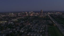 5.7K aerial stock footage of the skyline while ascending over neighborhoods at twilight, Downtown Buffalo, New York Aerial Stock Footage | DX0002_204_045