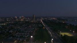 5.7K aerial stock footage reverse view of I-190 leading to skyline at twilight, Downtown Buffalo, New York Aerial Stock Footage | DX0002_204_051
