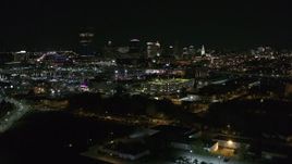 5.7K aerial stock footage of passing by the city skyline at night, Downtown Buffalo, New York Aerial Stock Footage | DX0002_205_005