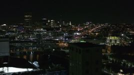 5.7K aerial stock footage flyby the skyline at night, reveal grain elevators, Downtown Buffalo, New York Aerial Stock Footage | DX0002_205_006