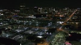 5.7K aerial stock footage of flying toward and past the skyline at night, Downtown Buffalo, New York Aerial Stock Footage | DX0002_205_010