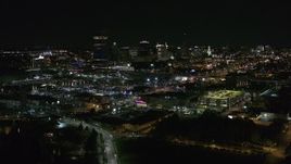 5.7K aerial stock footage of flying past the downtown skyline at night, Downtown Buffalo, New York Aerial Stock Footage | DX0002_205_016