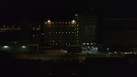5.7K aerial stock footage of circling a flour mill at night, Buffalo, New York Aerial Stock Footage | DX0002_205_022
