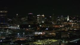 5.7K aerial stock footage of descending past office towers at night, Downtown Buffalo, New York Aerial Stock Footage | DX0002_205_029