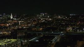 5.7K aerial stock footage of a wide view of Buffalo General Medical Center at night, Downtown Buffalo, New York Aerial Stock Footage | DX0002_205_036