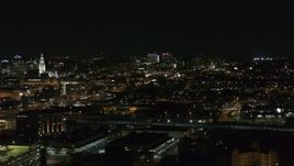 5.7K aerial stock footage of a wide view of distant Buffalo General Medical Center at night, Downtown Buffalo, New York Aerial Stock Footage | DX0002_205_037