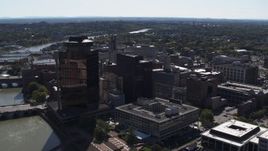 5.7K aerial stock footage of office buildings and hotel by the Genessee River, Downtown Rochester, New York Aerial Stock Footage | DX0002_206_013