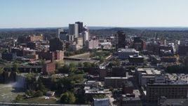 5.7K aerial stock footage a wide view of High Falls, Genesee River and skyline, Downtown Rochester, New York Aerial Stock Footage | DX0002_206_038