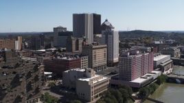 5.7K aerial stock footage of skyline seen from apartment complex, Downtown Rochester, New York Aerial Stock Footage | DX0002_206_043