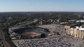 5.7K aerial stock footage fly away from Frontier Field to reveal Monroe Community College, Rochester, New York Aerial Stock Footage | DX0002_206_045