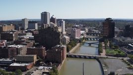 5.7K aerial stock footage flyby river bridges and skyline Downtown Rochester, New York Aerial Stock Footage | DX0002_207_004