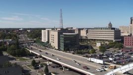 5.7K aerial stock footage flying toward the police station by I-490, Downtown Rochester, New York Aerial Stock Footage | DX0002_207_017
