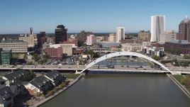 5.7K aerial stock footage fly away from bridges over Genesee River in Downtown Rochester, New York Aerial Stock Footage | DX0002_207_018