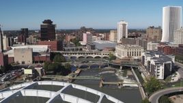 5.7K aerial stock footage fly away from bridges to reveal Douglass-Anthony Bridge in Downtown Rochester, New York Aerial Stock Footage | DX0002_207_021