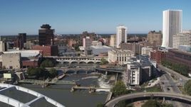 5.7K aerial stock footage ascend past traffic on the Douglass-Anthony Bridge for view of river and Downtown Rochester, New York Aerial Stock Footage | DX0002_207_036