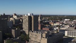 5.7K aerial stock footage fly away from an apartment complex in Downtown Rochester, New York Aerial Stock Footage | DX0002_208_004