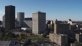 5.7K aerial stock footage focus on Five Star Bank Plaza, flyby apartment complex in Downtown Rochester, New York Aerial Stock Footage | DX0002_208_008