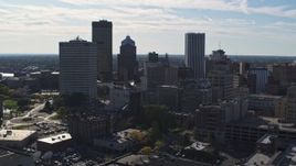 5.7K aerial stock footage of the city skyline seen while flying near Five Star Bank Plaza, Downtown Rochester, New York Aerial Stock Footage | DX0002_208_011