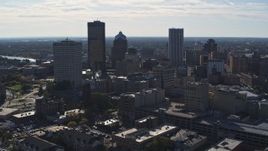 5.7K aerial stock footage descend with view of the city skyline, Downtown Rochester, New York Aerial Stock Footage | DX0002_208_013