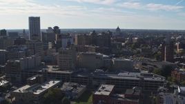5.7K aerial stock footage flyby office buildings and parking garage, Downtown Rochester, New York Aerial Stock Footage | DX0002_208_016