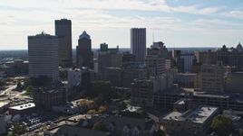 5.7K aerial stock footage focus on the city skyline while descending, Downtown Rochester, New York Aerial Stock Footage | DX0002_208_022