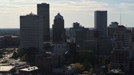 5.7K aerial stock footage of descending past skyscrapers and office towers in Downtown Rochester, New York Aerial Stock Footage | DX0002_208_033